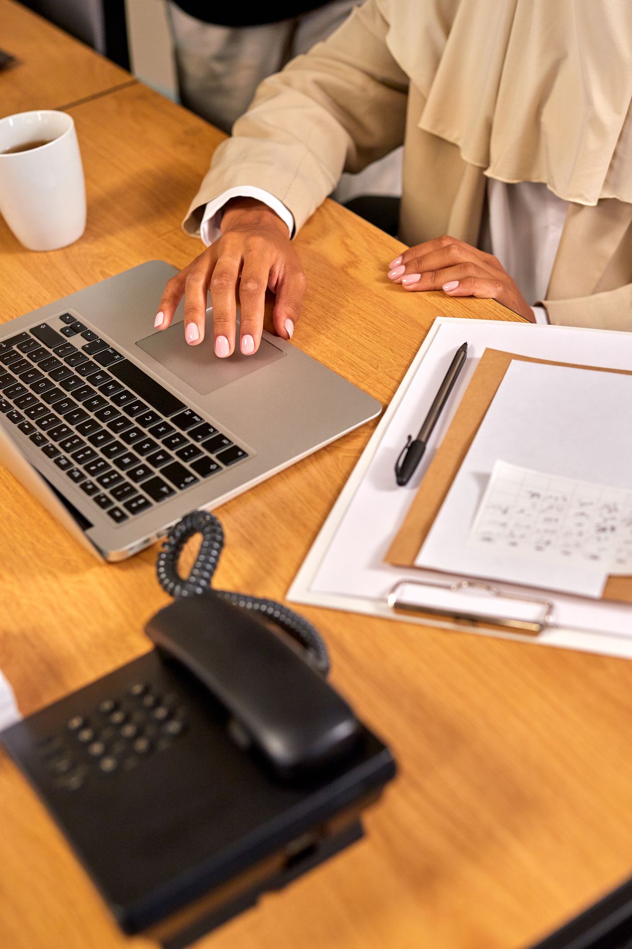 Modern desk phone for AI cloud phone service in a South Florida business office